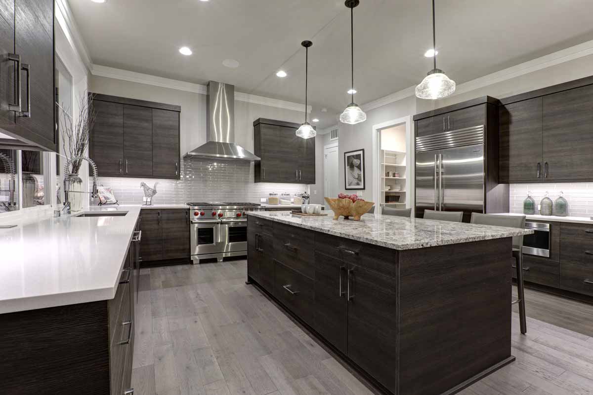 Large kitchen with stainless steel appliances and granite countertops